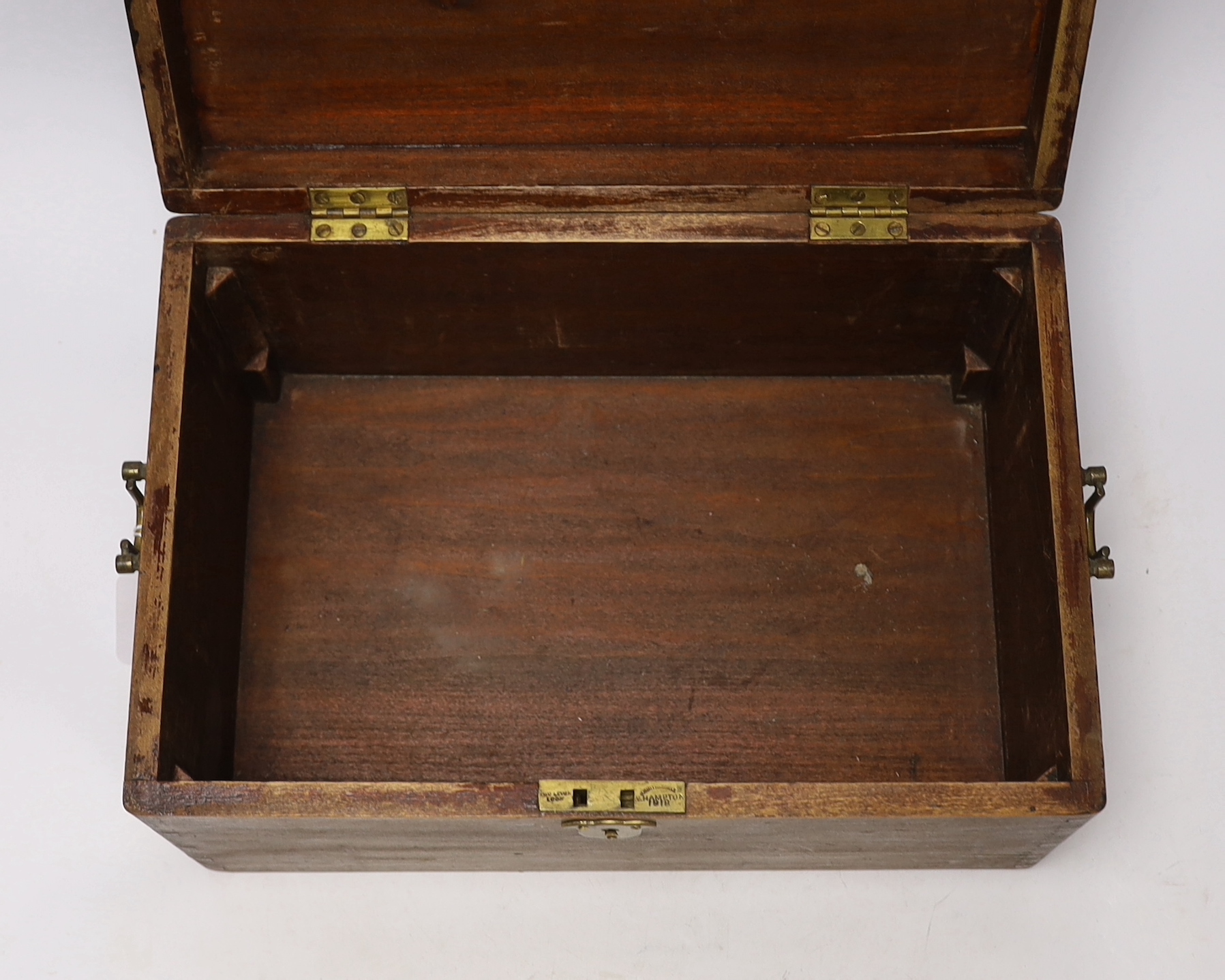 Two mahogany boxes of gun tools, including; bullet moulds, files, a vice, musket balls, etc.